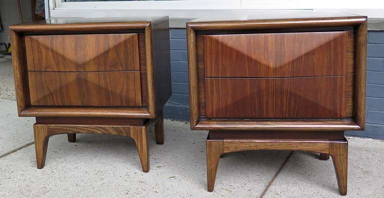 Restored. 2 drawers. Dark walnut lacquer. A couple of different wood colors, but mostly brown walnut. Some minor marks , one small indent on top of one. Awesome design!