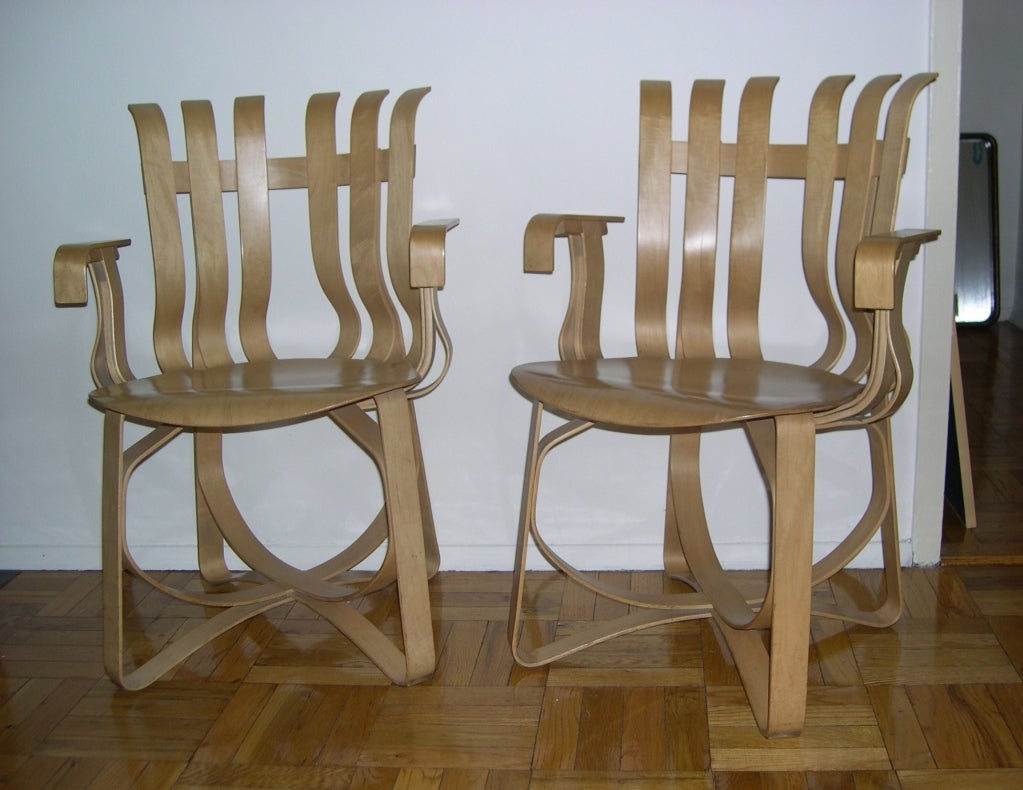Pair of Frank Gehry Hat Trick side/dining chairs, made by Knoll.