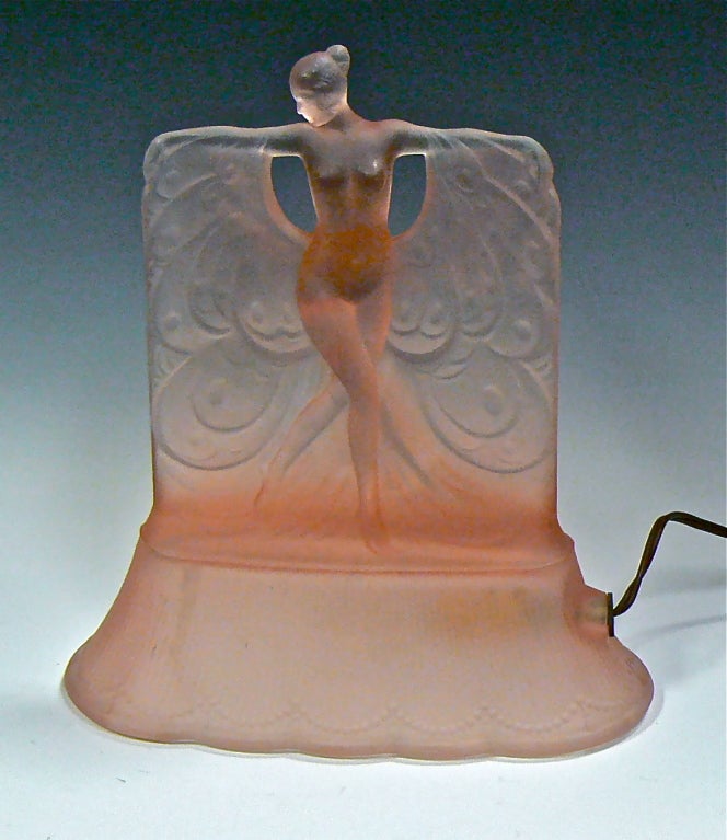 This art deco boudoir lamp by McKee Glass Company of Jeannette, Pa. (1888-1951) is modeled after the 