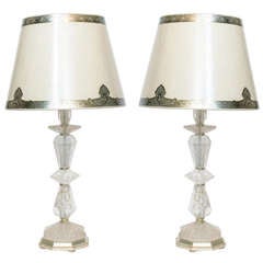 A brilliantly clear pair of multi faceted cut rock crystal lamps