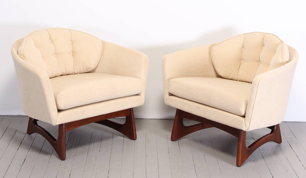 A pair of Adrian Pearsall lounge or arm chairs. Newly restored finish to wood. Newly upholstered in wheat by Pindler and Pindler. New York City Delivery would be $249.00