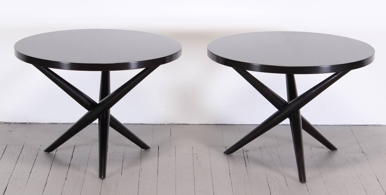Pair of tripod tables designed by T.H. Robsjohn-Gibbings for Widdicomb, circa 1950s. The tables are newly restored with a Hand rubbed Satin Semi-Gloss Finish.
