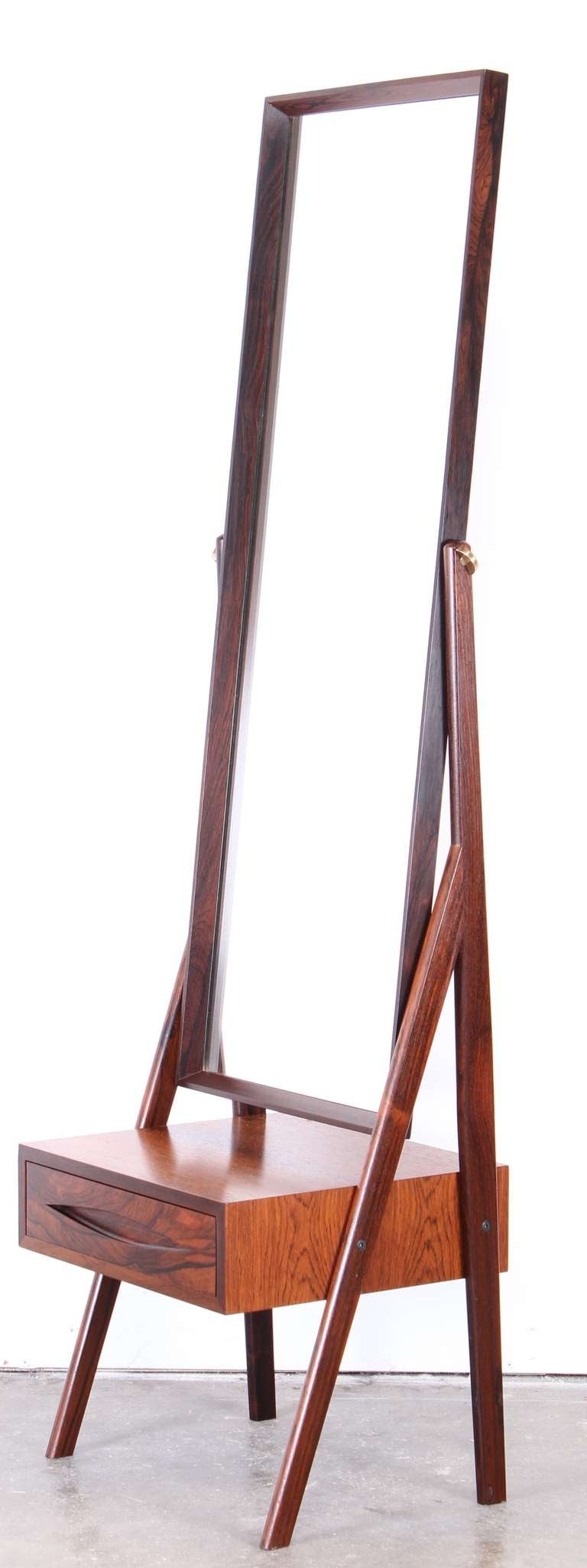 1960's Danish rosewood cheval mirror with beautiful wood grain and simple modern lines.