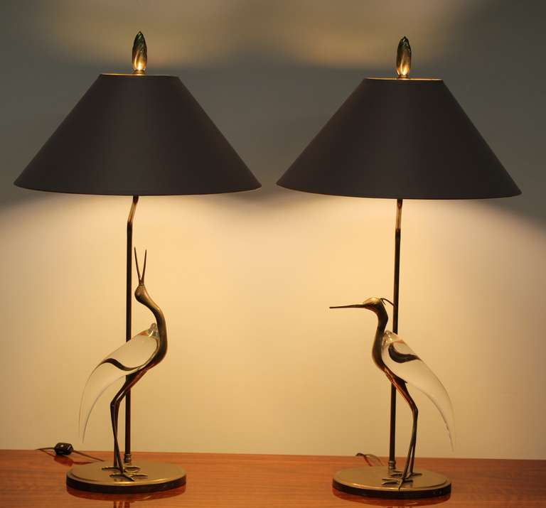 A pair of exquisite crystal and brass egret lamps by Chapman.