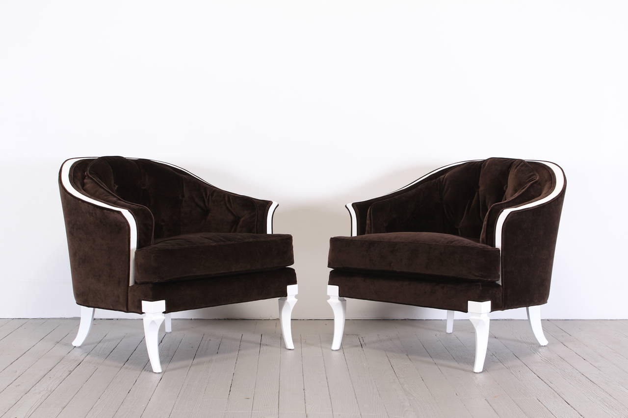 A pair of white lacquered frames with chocolate 