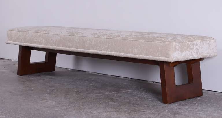 An excellent Paul Frankl bench newly refinished and upholstered in cream velvet.