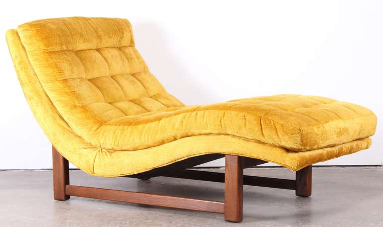 A vintage Mid Century Modern Adrian Pearsall style chaise lounge with tufted cushion in original fabric. New fabric suggested.