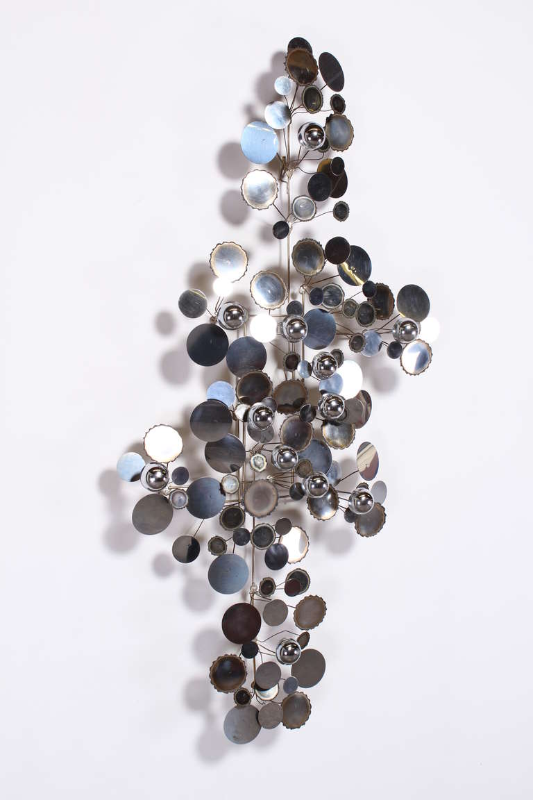 A large vintage Curtis Jere wall hanging of raindrops in mixed metals, chrome, silver plate.
