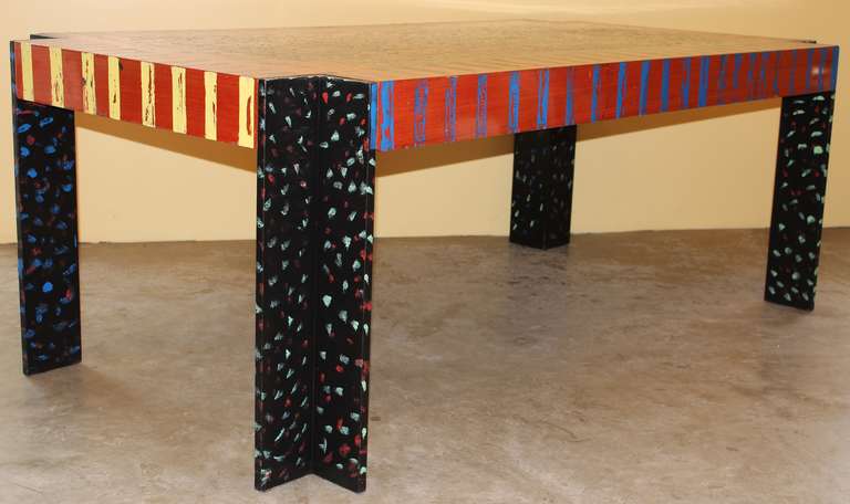 A Modernist Pop Art Memphis style painted desk or table. The paint has been added later by an artist. This is an unusual one of a kind desk that has both form and function and artistic design. There are three large drawers across the front for