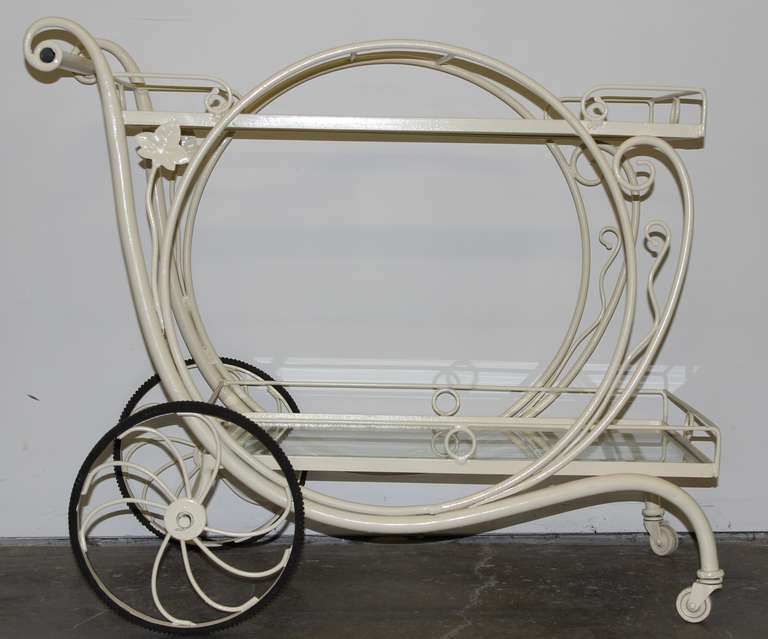 A great stylized two tier tea cart.  A must have accessory to for entertaining on your patio.