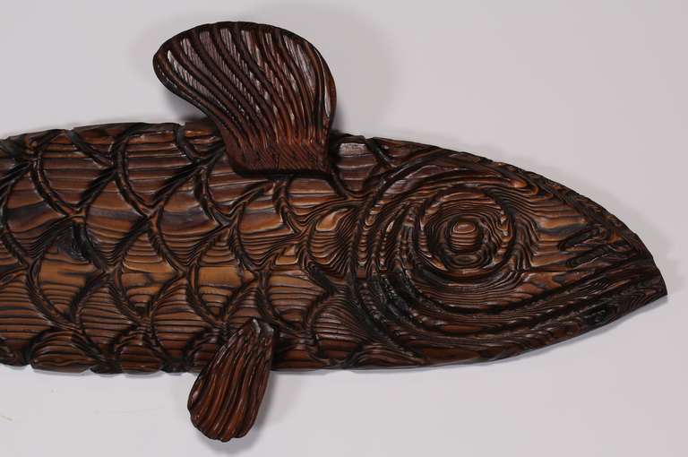 large wooden fish sculpture