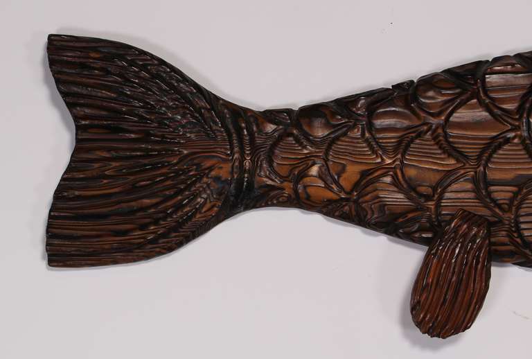 carved wooden fish wall hanging