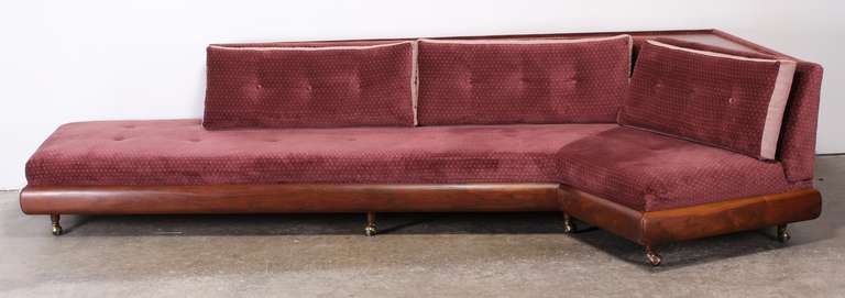 This is one of Adrian Pearsall's Iconic designs. A very dramatic and modern sofa in the shape of a boomerang. Refinishing and uphostery services available at Alternative Furnishings Inc. Please inquire for quotes.