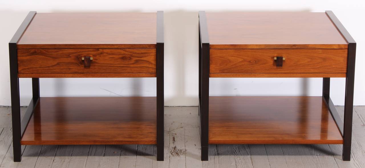 A pair of Edward Wormley bedside or end tables for Dunbar. Edward Wormley designed for Dunbar who made furniture that was elegant, understated and exceptionally well-made. In 1944 Dunbar decided to focus strictly on modern lines. These pieces have