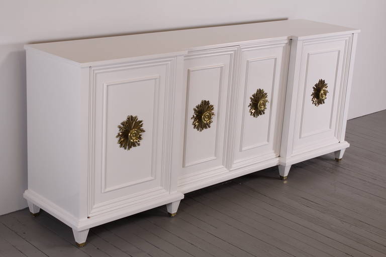 This exquisite Hollywood Regency credenza is made by Bethlehem Furniture Company which was known for manufacturing high end quality furniture in the mid 20th century.  The credenza is professionally refinished by Alternative Furnishings Inc.