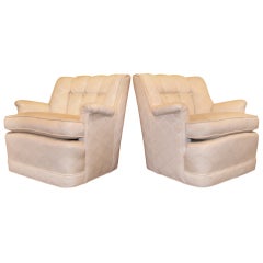 Pair of Swivel Club Chairs in the Style of Edward Wormley