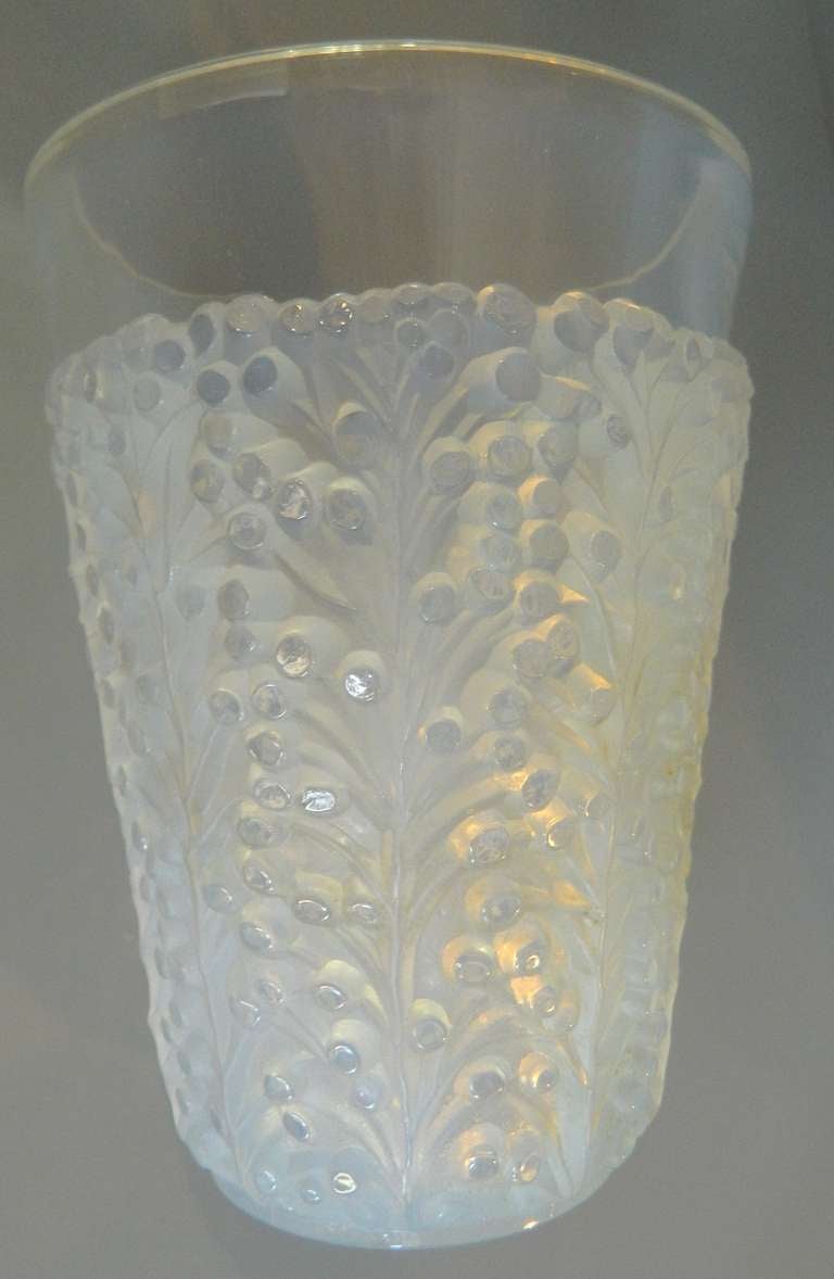 R Lalique St. Tropez opalescent vase from the 1930's and now discontinued. A second is available in clear frosted for $1250.
