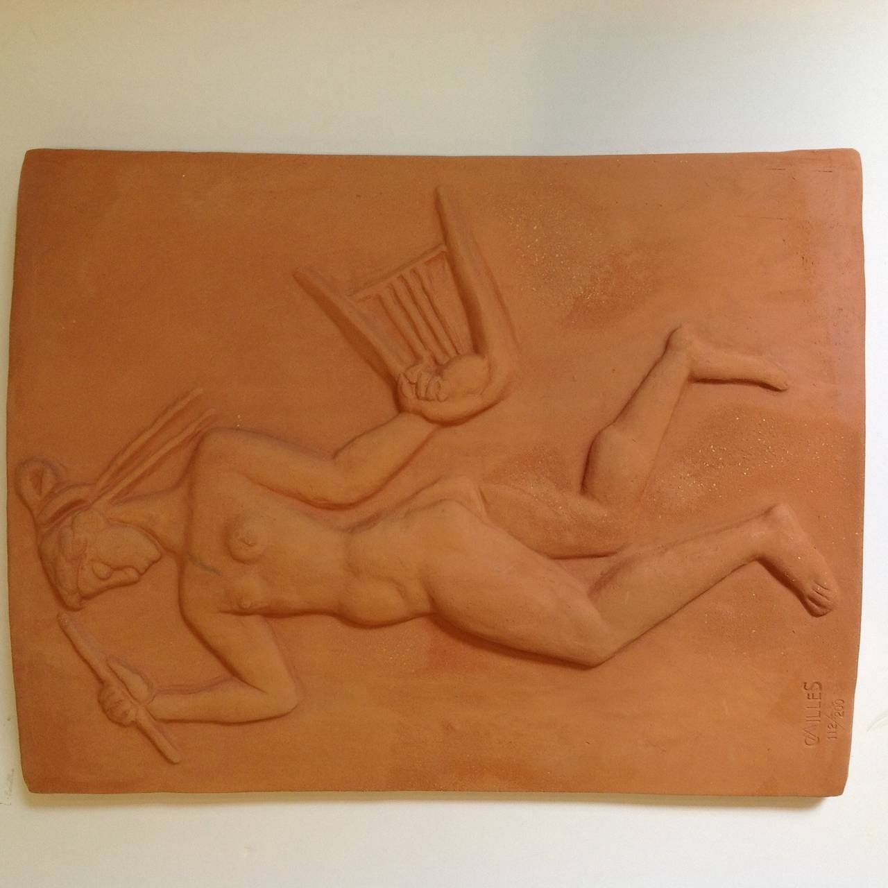 Terracotta plaque of a Terpsichore, a Muse by Swedish sculptor Carl Milles (1875- 1955).
It is signed C Milles 112/200. One of two from a Houston estate we are listing today. 
A graduate of the Sorbonne, and assistant to Rodin, Milles spent twenty
