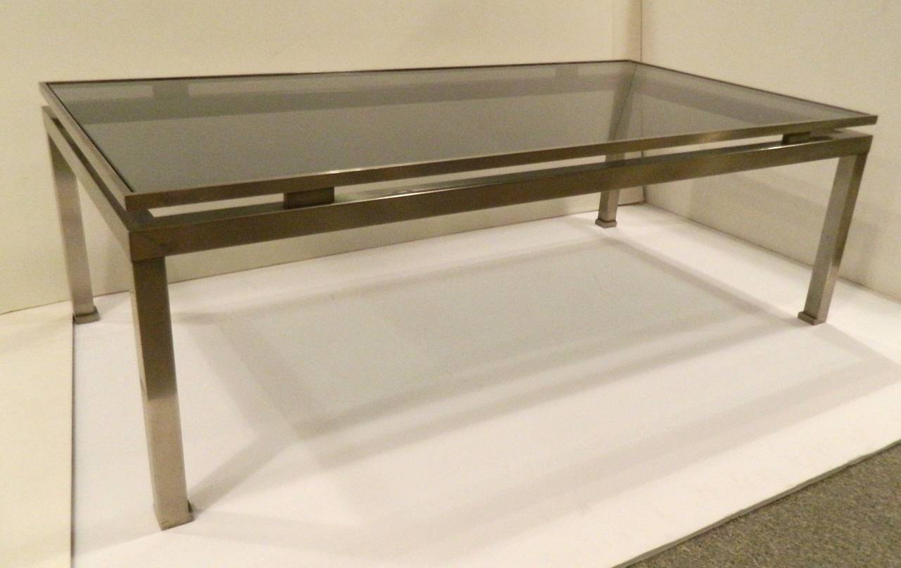 Classic modern brushed-steel coffee table designed by Guy Lefevre for Maison Jansen, France, 1960-1970s. Beautiful condition!