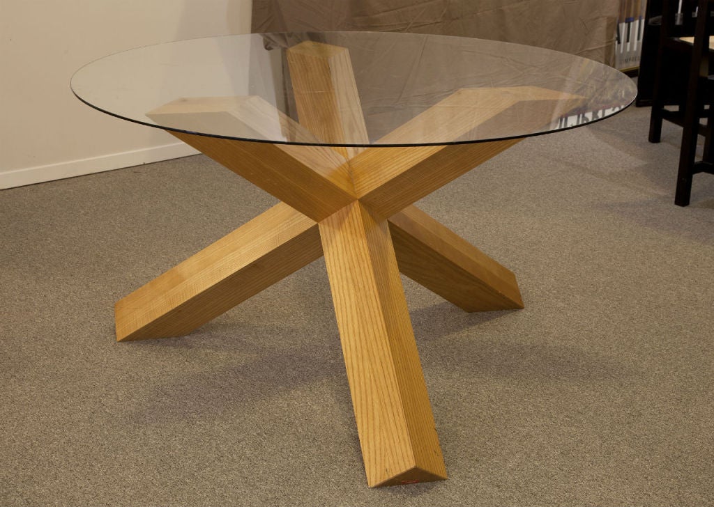 Round table base in natural ashwood by designer Mario Bellini, made by Cassina.