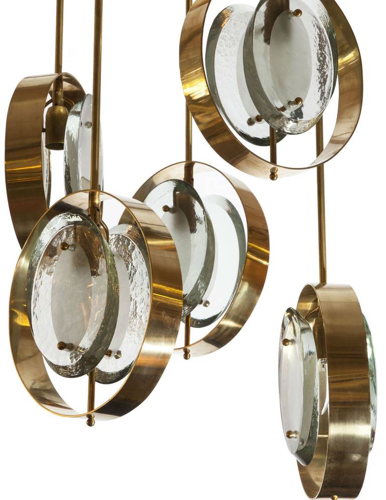 Chandelier in the style of Max Ingrand for Fontana Arte with five crystal discs in gold plated brass frames with one light in each one. Circa late 1950s to 1960s