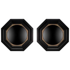 A pair of large octagonal convex mirrors