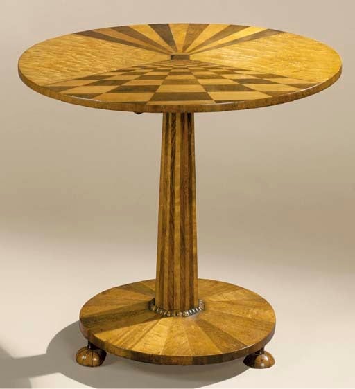 The circular top inlaid with perspective parquetry decoration and supported by an hexagonal tapered column with a bead-moulded collar, the circular segmental veneered base raised on three domed feet.