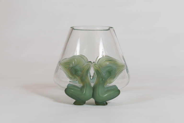 Lalique offered this design exclusively in 1975.  The clear crystal vase is supported by four female figures.  It was made with the double injection technique, requiring 25 glassmakers over a period of six weeks.