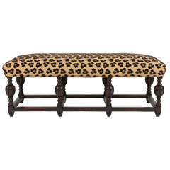A Renaissance Revival Upholstered Bench