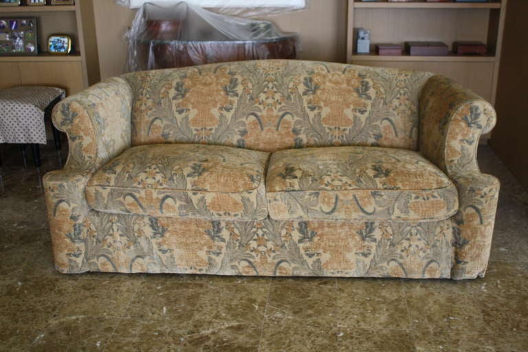 Elegant, never been used custom sofa covered in soft chenille. Pleasing serpentine back with outscrolling arms.  Deep and plush.