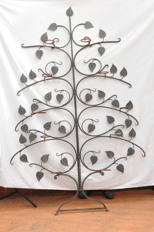 A rare and hard to find Salterini wrought iron tree, or plant stand, there are 10 plant holders which attach and are perhaps difficult to see, but are there. Planters are “in” this season, check out the spring  “Martha Stewart Living”