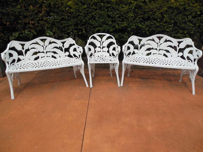 A 3-piece cast iron garden set in the fern pattern, consisting of 2 benches and 1 armchair, all freshly repainted in great condition.
One bench is 42