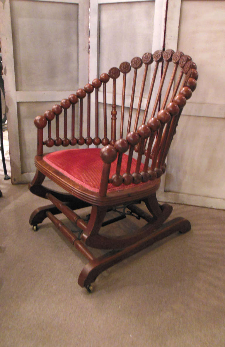A late 19thC  Rocker by George Hunzinger (1835–1898), one of nineteenth-century America’s most innovative and idiosyncratic furniture makers. This Paper labeled Oak Rocker is in the desirable Lollipop pattern that is he so famous for. 
 A platform