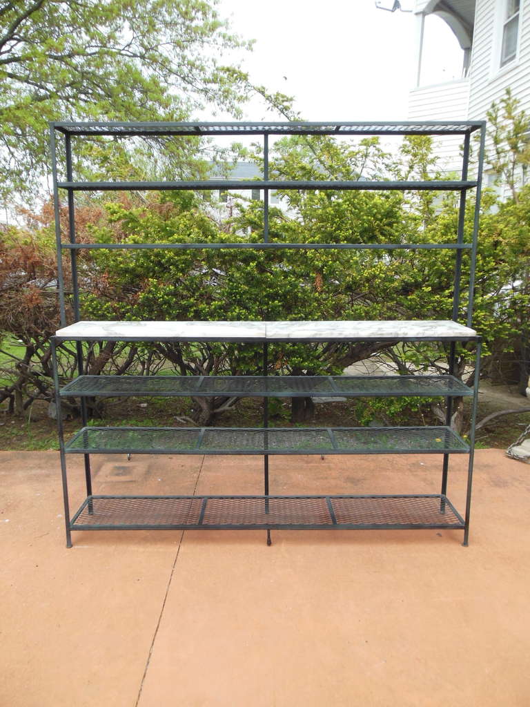 This is a wrought iron Mid Century Modern experimental piece by John Salterini.
When John Salterini suddenly died in 1953 there was a panic amongst the workers of his company. Mr Cooperman of Brooklyn was foreman of the Brooklyn NY factory that made