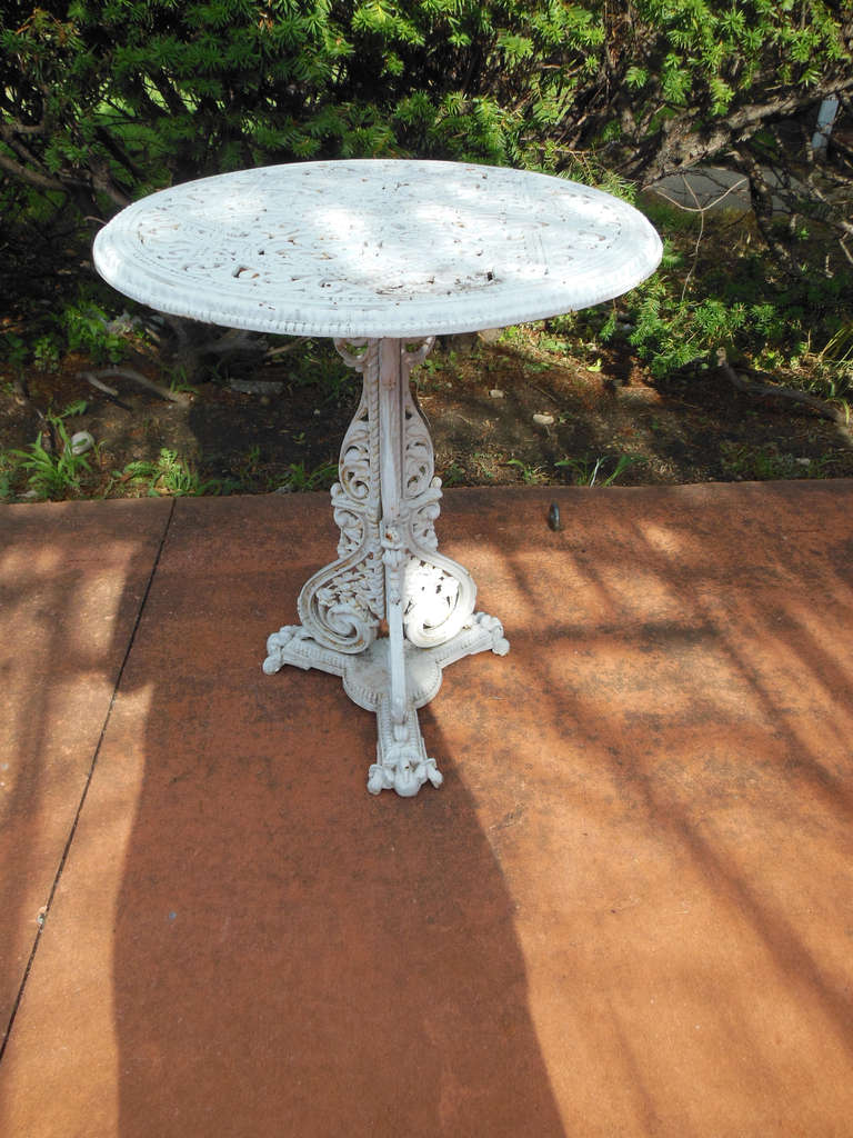 A small circular cast iron table, designed by Christopher Dresser
for Coalbrookdale. Dresser designed furniture for Coalbrookdale 
between the late 1860s-1880s. The table relates to other 
Coalbrookdale designs by Dresser. Please note on the