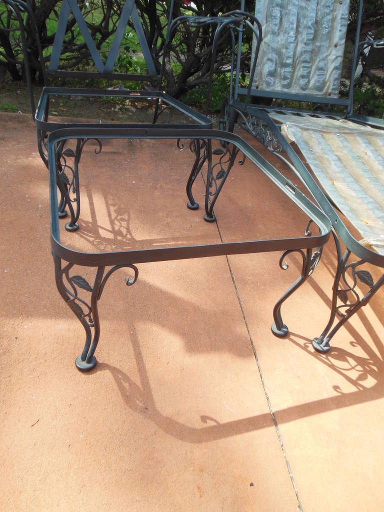 A 4 piece patio set by Woodard mid 20th Century. This pattern is called Chantilly Rose and was there most popular pattern. The set pictured here
consists of a chaise lounge, an armchair and matching ottoman and a bouncer.
Also, in inventory in the