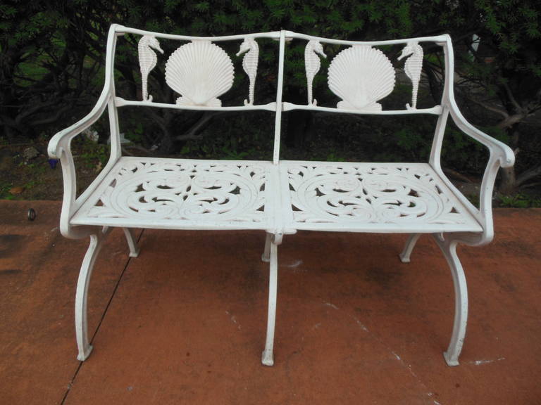 A cast aluminum garden bench by Molla in the shell and seahorse pattern.
Molla is famous for making the shell and seahorse pattern for the garden.
This desire able pattern furnished the patio gardens of the famous Breakers
Hotel in Palm Beach.