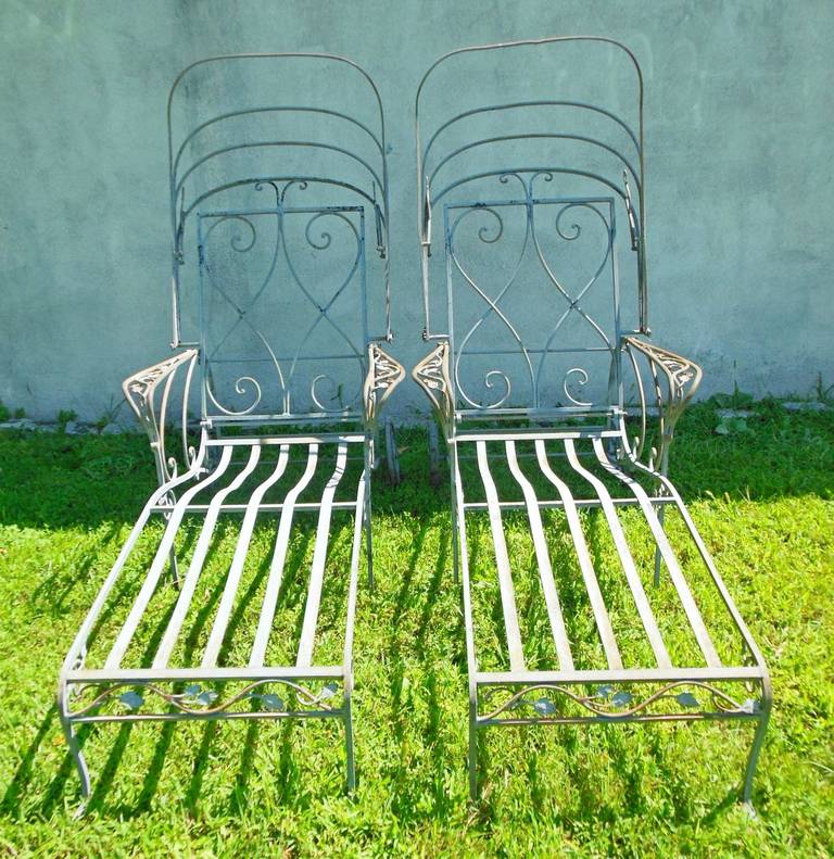 A hard to find pair of wrought iron garden chaise lounges by John Salterini.
Imagine sitting in these beauties, under the fabric ( that you make) canopy in the sun. Finding canopies on chaises is difficult. This pair was found on Long 
Island's