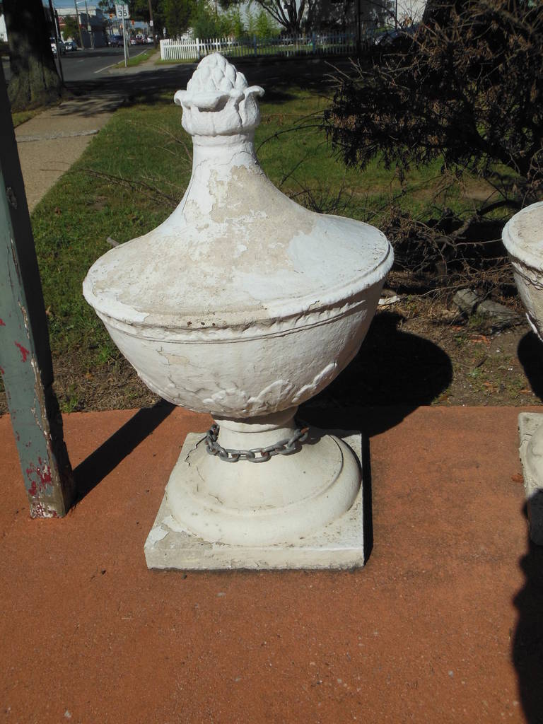 A large pair of cast stone finials from the famous Long Island NY Garden City Hotel. One of the porches of the Victorian Hotel, in AT Stewarts home town 
was lined with these 38" tall finials that are 24" round. I only have two of them. I