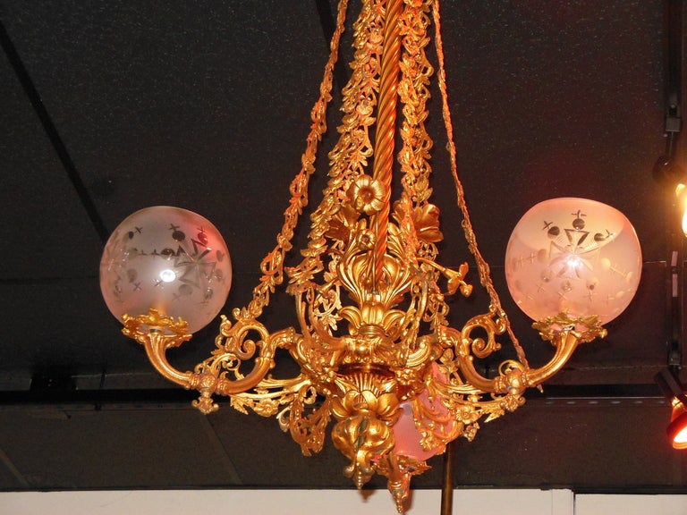 An ornate pair of American gas chandeliers by Hooper of Boston. Hooper was a competitor of Cornelius & Co of Phila. A catalog of the Hooper Co. is at Winterthur Museum, and these fixtures match chandeliers in the catalog. The pair of fixtures have