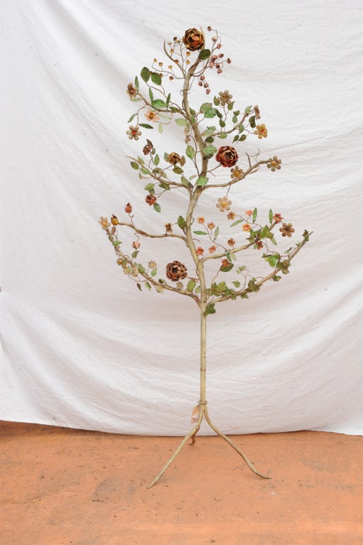 An Italian hand-painted tole rose tree, these Italian trees are getting harder to find, all paint original. This is a great example of the Hollywood Regency style.