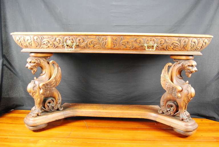Beautiful detail with hand carved griffins.  The 