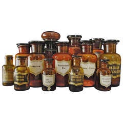 Vintage Set of Thirteen Amber Glass Apothecary Bottles