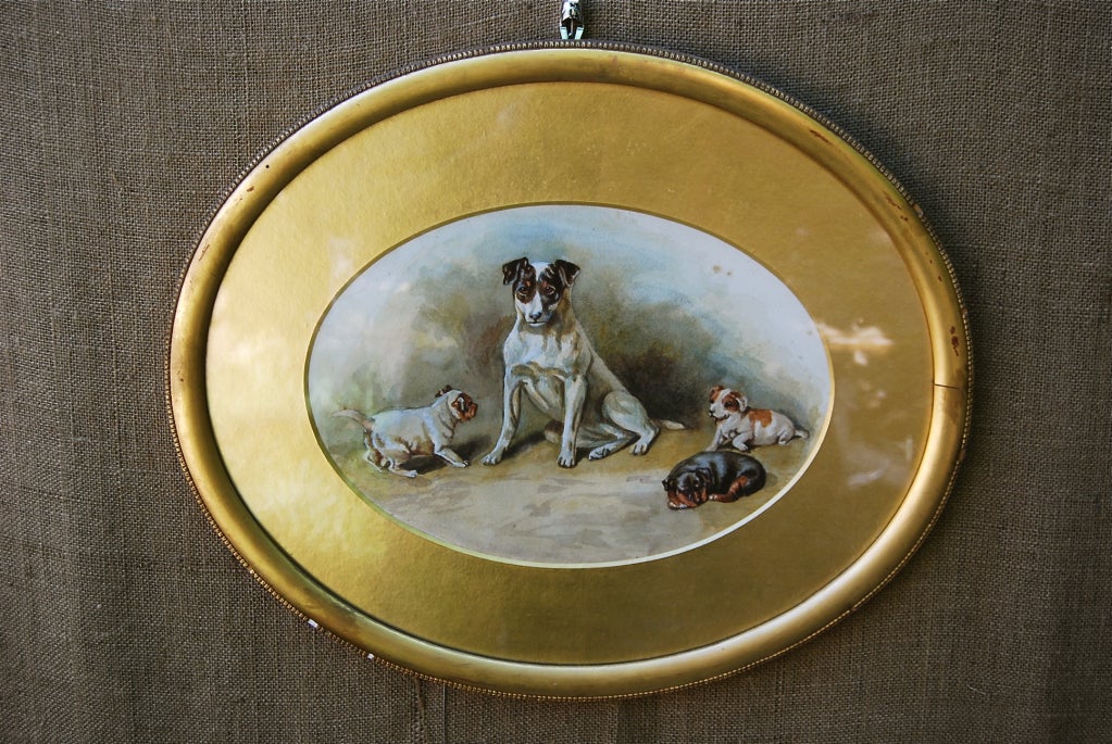 Antique terrier framed watercolor in water gilt frame.