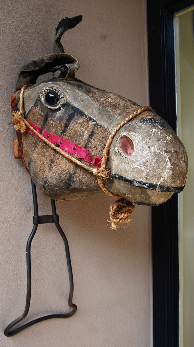 Adorable carnival Mule/Horse head made of papier mache and fabric.  Hand forged handle.