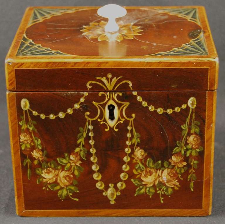 Lovely antique painted tea caddy circa 1785. Ivory escutcheon  and top pull.
