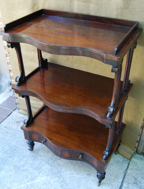 Rosewood Trolley that could be used as a server, bar or side table.  Lovely carving and patina!