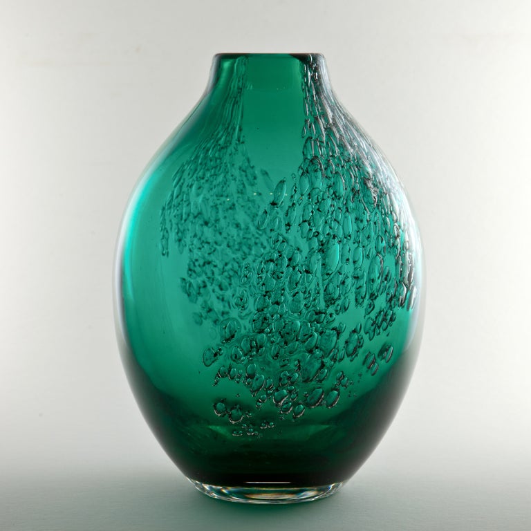 MAURICE MARINOT green vase, internally decorated with silver oxides.

Signed - MARINOT