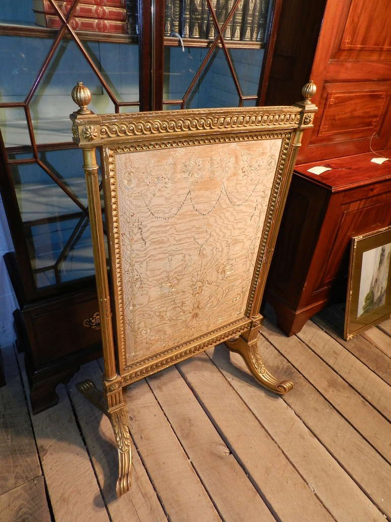 Gilt wood firescreen or tapestry stand with silk embroidered panel.