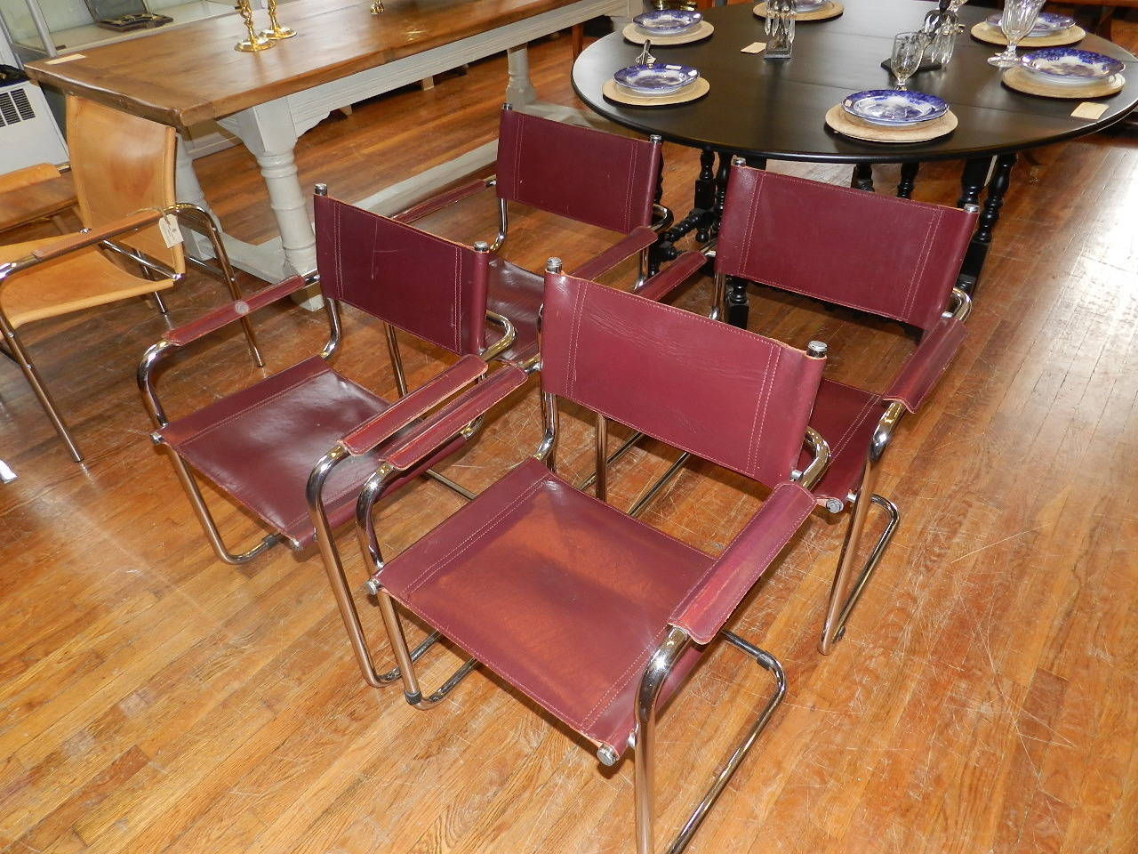 Set of four leather chairs with tubular chrome frames designed by Italian designer Matteo Grassi.